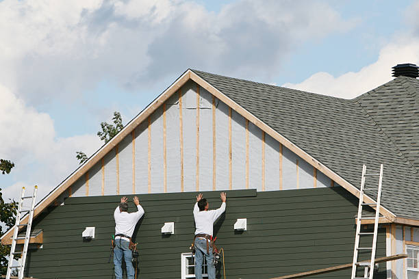 Professional Siding technician working in Sophia, NC